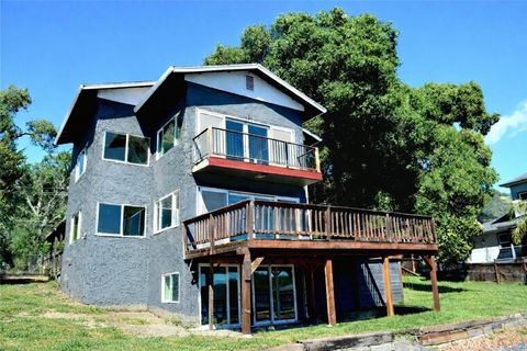 Photo of 10523 E Highway 20, Clearlake Oaks, CA 95423 (MLS # LC26071179)