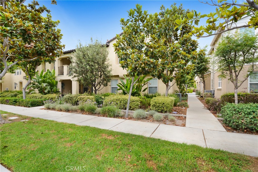 FHA APPROVED!!! Discover resort-style living at its finest in this exquisite and recently fully remodeled home, built in 2007 by Shea Homes, in the highly sought-after Preserve community. Offering 2022 sq. ft. 3 bedrooms and 2 full baths PLUS a versatile loft/office, this residence features an open floorplan designed for modern living. All your living space is conveniently situated on one floor in this carriage unit as no expense was spared when the homeowner recently remodeled this home, from the designer interior paint to the beautiful plank flooring that compliments the plethora of windows adorned with elegant plantation shutters. The stunning kitchen is equipped with stainless steel appliances and a huge island with bar seating, quartz countertops and an abundance of cabinet storage along with charming window inserts that bring additional light and charm to the space. The living room features a stunning curved fireplace, adding a touch of sophistication and warmth to the space with new LED lights throughout. The oversized balcony, just off the dining area and living room, offers serene views of lush trees, creating a tranquil backdrop for relaxation and entertaining. The primary and ensuite is a luxurious retreat and spacious layout that invites relaxation it boasts a designer walk-in closet, dual sinks and a breathtaking 4-occupant wall to wall shower. This home also includes a private laundry room, a 2-car attached garage with epoxy flooring while providing ample storage and convenience. As a resident of the Preserve, you'll have access to award-winning onsite schools and an array of resort-style amenities. Enjoy the Parkhouse, Garden House & the Meadow House with amenities such as Olympic pools, spas, BBQ areas, tennis courts, library, business center, movie theater, community garden, outdoor fireplace, orchards, fitness center, baseball fields, basketball courts and dog park. providing endless opportunities for recreation and relaxation. Within walking distance, you can enjoy the newly developed Preserve Town Center with an array of restaurants and shops for your convenience. 8414 Forest Park St at The Preserve Community in Chino is truly your next place to call Home!