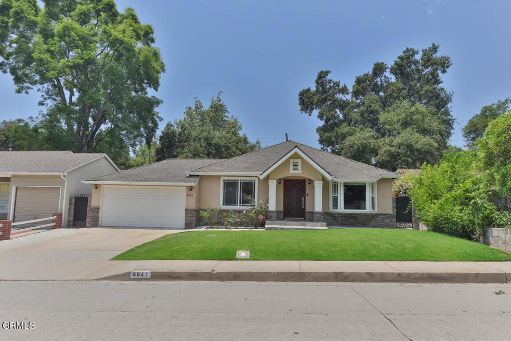 Welcome to 4841 Crown Ave. This large 4 bedroom, 3 bath home with pool and jacuzzi is located in the heart of La Canada. Close proximity to PCY elementary school as well as LCHS and private schools on Foothill. This desirable location makes it perfect for La Canada living. Remodeled in 2008, the open and spacious floorpan features a welcoming living room and formal dining room space. Two bedrooms toward the front of the home share 3/4 bath. Additionally, you are greeted with an impressive chef's kitchen with Viking appliances, built in refrigerator and freezer and an island that opens to a family room that looks out to the newly remodeled pool. Off the hallway, is a third bedroom with ensuite bathroom and large closet space. To the back of the home, there is a large primary suite with an extra den space, perfect for home office or home gym. With hardwood floors throughout the home, wired security system ready to activate, water softener, crown molding, dual pane windows, upgraded plumbing and electrical, this home is maintenance free. Washer and dryer is included as well.