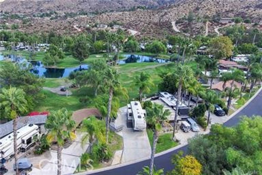 Site 249 - Welcome to Your RV Resort Sanctuary!!

This stylish site boasts sleek, modern finishes and an abundance of natural light that dances through the generous screens. Enjoy the pleasure of having two enclosed gazabos with an open-air barbeque grill in between. Decorated with white marble entertaining family and guests will be at its best . The first gazebo is where you'll find the kitchen area which has a sink, dishwasher and full-size refrigerator. Savor your morning privacy and coffee in the second gazebo where golf course views unfold before your eyes. 

Sitting wall for extra Entertaining and a back patio to watch the golfers and just basking in the beauty that is the Water. 

Nestled in a vibrant RV community, this site is your gateway to a dynamic lifestyle, complete with California Palm Trees for shade and beauty.

Come check this one out and you may have your next getaway. 

Rancho California RV Resort provides amenities such as a 14-hole Executive PAR 3 Golf Course (no fees for owners), 5 Pools/Jacuzzis, Tennis courts, Pickleball courts, Dog park, Club house, hiking trails, Horseshoe lawn and onsite grocery market. The resort is guard gated with no age restrictions. Monthly HOA fee includes unlimited use of the golf course, amenities, trash pickup at lot, water/sewer and common area maintenance. If you are considering a premier Southern California RV destination with convenient access to San Diego, Palm Springs and SoCal beaches, don't miss out on visiting Rancho California RV Resort.