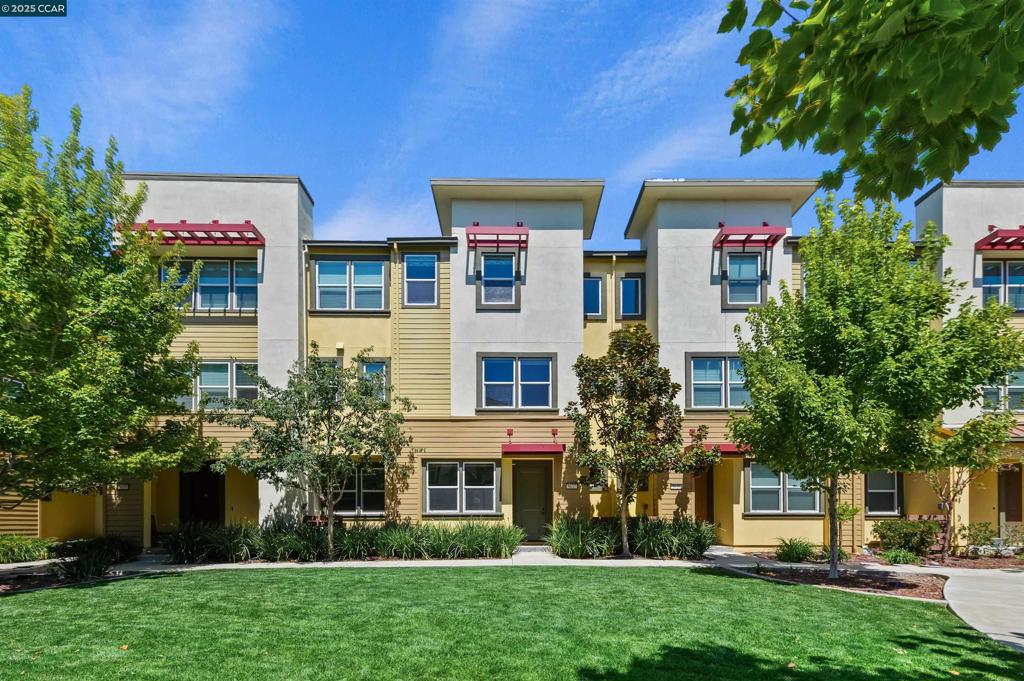 Perfect Location, Low Taxes & Modern Living! Just a 10-minute walk to BART and a 5-minute walk to Don Biddle Park with a children’s playground, basketball, and tennis courts—plus no Mello-Roos, meaning low property taxes! This gorgeous 4-bedroom, 3.5-bathroom townhouse offers the perfect balance of convenience, comfort, and style. Step inside to a bright, open layout featuring a spacious living area, an upgraded gourmet kitchen with a large quartz island, stainless steel appliances, and an abundance of natural light. The family room is ideal for entertaining or relaxing at home. Other notable features include, engineered hardwood flooring throughout (except stairs), designer custom closets in the master suite + 2 bedrooms, attached 2-car garage with overhead storage, central A/C & heating with Nest thermostats and smart switches (Google/Alexa compatible), whole-house water softener + under-sink RO filter and flexible space for a home office Ideally located close to top-rated schools, San Francisco Premium Outlets, and Hacienda Crossings. With easy access to Hwy 580/680/84, this is a commuter’s dream home. Don’t miss this opportunity—schedule a showing today!