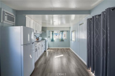 Photo of 9020 Somerset Boulevard #19, Bellflower, CA 90706 (MLS # HD26111387)