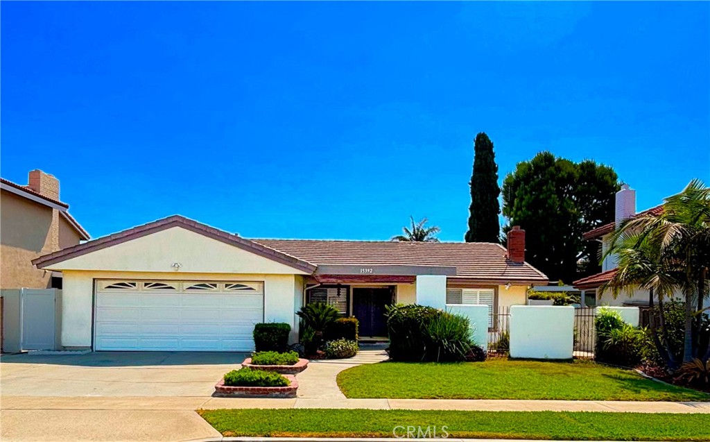 Highly Upgraded Single-Level Lease in Westminster! Welcome to 15392 Maryknoll, a beautifully upgraded single-level home for lease, perfectly situated on a peaceful cul-de-sac in Westminster. This inviting property offers 1,680 square feet of comfortable living space, featuring 3 bedrooms and 2 bathrooms, all on a well-maintained 6,100 square foot lot. Step through the elegant double door entry and discover a home thoughtfully renovated with modern touches throughout. The stunning kitchen is a true focal point, boasting sleek quartz countertops with convenient bar seating, a stylish stainless steel sink and appliances, brand new cabinetry, a contemporary subway tile backsplash, and both pendant and recessed lighting. The spacious living room provides a relaxing ambiance with a charming fireplace featuring a stone hearth and soaring vaulted ceilings. The open floor plan seamlessly connects to the family room, complete with a ceiling fan and a large slider that opens to the expansive backyard. The primary bedroom offers a tranquil retreat with a desirable walk-in closet, ceiling fan and elegant plantation shutters. The en-suite primary bathroom features modern quartz countertops and convenient dual sinks. The second bathroom, located in the hallway, showcases beautiful granite countertops, easy-to-clean tile floors, and a practical tub and shower combo. Enjoy the convenience of an inside laundry room with both gas and electric dryer options. The attached two-car garage houses the water heater and offers valuable built-in cabinets for storage. Additional storage can be found in the hallway with a linen closet and a built-in featuring attractive granite countertops. Relax and enjoy the outdoors on the large front patio. The home features stylish and durable luxury vinyl plank flooring throughout. The private backyard offers a covered patio for shade and outdoor dining, secure block and vinyl fencing, and a mature orange tree. The front and backyards are beautifully landscaped with fruit trees, palm trees, and exotic plants, featuring a timed sprinkler system, with gardening service provided twice a month. This home is situated in a highly desirable neighborhood in Westminster that borders Huntington Beach, in an established and well-kept community with a newly updated park. The property is conveniently located across the street from Goldenwest College, with easy access to nearby freeways, shopping, dining, and entertainment.