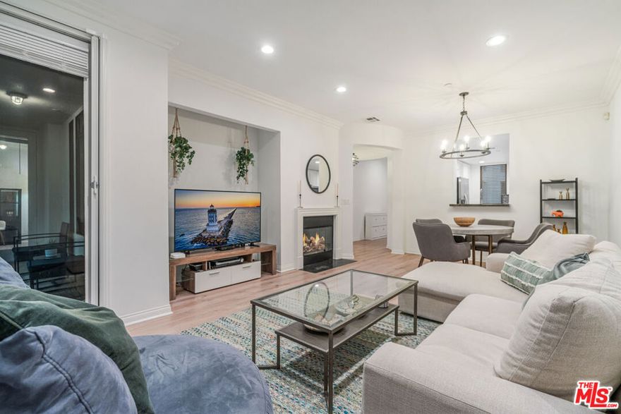 Welcome to this beautiful 2-bedroom, 2-bathroom single-level condo in the desirable "Metro" building of Playa Vista This first-floor residence offers a thoughtfully designed layout with an open-concept living space that includes a cozy fireplace and seamless access to a private patio surrounded by lush, mature landscaping, an ideal spot to relax or enjoy your morning coffee. The well-appointed kitchen features ample cabinetry, stainless steel appliances, and a dining area perfect for everyday meals or casual entertaining. The spacious primary suite is a true retreat with his and hers matching closet space, a spa-inspired en suite bathroom offering dual vanities, and a large soaking tub. The second bedroom is ideal for guests, a home office, or a flexible creative space. Additional highlights include recessed lighting throughout, in-unit laundry, and two side-by-side parking spaces. As a Playa Vista resident, you'll have access to resort-style amenities including pools, fitness centers, a clubhouse, theater, basketball courts, playgrounds, dog parks, and daily shuttles. All of this is just minutes from the beach, LAX, shopping, and dining.