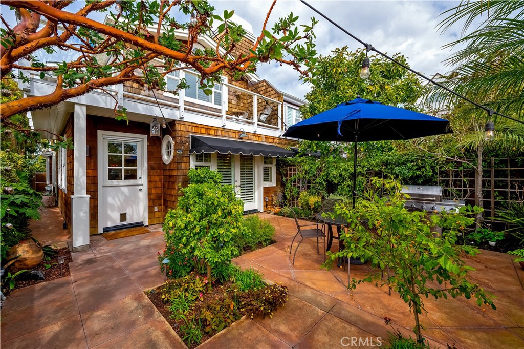 ENJOY BLISSFUL COASTAL LIVING AT ITS BEST in this exquisitely upgraded home ideally situated in the coveted 'tree streets' of North Laguna Beach, so close to Main Beach and all that Laguna has to offer! 3 bedrooms plus an office, 3 baths. Enter into a private enclosed courtyard with fountain, lush trees and gardens, new BBQ, cafe lights, sitting area, creating an outdoor extension of the home for relaxed al fresco dining, entertaining and family gatherings. Charming Dutch-door entry into open floorplan living room with warm inviting fireplace and beautifully appointed new furnishings throughout creating that cozy beachy atmosphere. The fully stocked gourmet kitchen is a chef's delight with double ovens, Sub-Zero fridge, large walk-in pantry, stunning granite stone countertops, designer Italian lighting over large center island. Direct access 2 car garage leads into hallway, straight through into kitchen area. The hallway also has a half bath and a large office with new printer, WIFI, Internet Cable, built-in desk. (Office room could be set up as a 4th bedroom) Tile flooring on main first level with wood flooring in office, beautiful wood flooring throughout upper level. -Main upstairs bedroom with wrap around balcony and shimmering ocean views and a stunning ensuite bath with jetted tub and separate shower, double vanity sinks, large walk-in closet. Secondary two bedrooms share a double-sink full bath. Back bedroom enjoys a large balcony with peekaboo ocean views and high vaulted ceilings. Conveniently close to all Laguna offers: Heisler Park, Diver's Cove, beaches, Museum of Art & galleries, Pageant of the Masters, Laguna Playhouse, restaurants and town. Includes utilities, gardener and a housekeeper every 2 weeks. A perfect home in an ideal location! Summer rates, June-Sept, are $14,500. Available beginning Oct. 1, 2025.