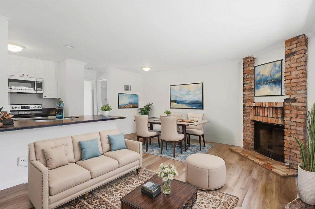 This 1st floor single-level 2-bedroom, 2-bathroom condo offers a split floor plan with an attached garage, private patio, and a kitchen with stainless steel appliances that's larger than most in the community. Inside you’ll find a living room with a wood-burning fireplace and updates throughout. Private garage and additional parking space included. Laundry location is located only 5 ft from the front door, and the community is gated. Just minutes from the Lafayette Hotel, Café Madeleine, TapRoom Beer Company, Balboa Park, and so much more in the heart of San Diego’s best urban lifestyle! Easy freeway access (805 and 15) as well. This 1st floor single-level 2-bedroom, 2-bathroom condo offers a split floor plan with an attached garage, private patio, and a kitchen with stainless steel appliances that's larger than most in the community. Inside you’ll find a living room with a wood-burning fireplace and updates throughout. Private garage and additional parking space included. Laundry location is located only 5 ft from the front door, and the community is gated. Just minutes from the Lafayette Hotel, Café Madeleine, TapRoom Beer Company, Balboa Park, and so much more in the heart of San Diego’s best urban lifestyle! Easy freeway access (805 and 15) as well.