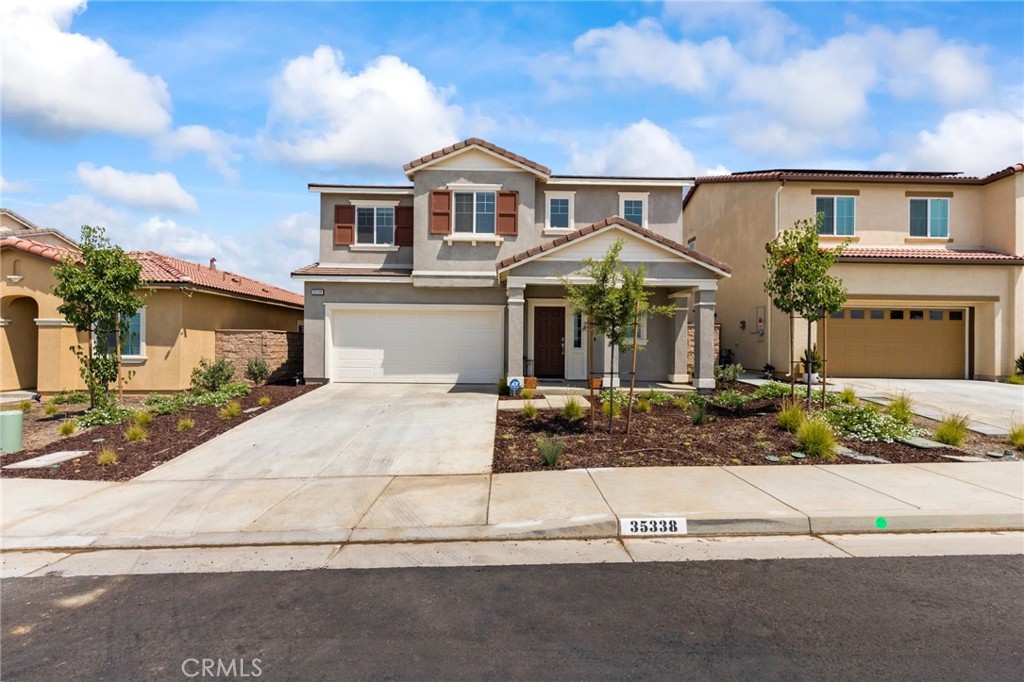 Welcome to this beautifully designed golf course home featuring a charming covered front porch and stunning mountain views. Step inside to an open-concept great room that flows seamlessly from the kitchen and dining area to the family room. The gourmet kitchen offers a large center island with granite countertops, stainless steel appliances, and recessed lighting—perfect for everyday living and entertaining. Another main level feature is the luxurious primary suite with two walk-in closets, dual sink vanity, and an oversized walk-in shower, plus a convenient half bath for guests. Upstairs you’ll find the loft area at the top of the stairs and two spacious bedrooms with a full bathroom. Additional highlights include a tankless water heater, modern finishes and lots of storage throughout the house. The large backyard has plenty of room for outdoor relaxation and family time. Enjoy breathtaking snow-capped mountain views in the winter, or sit and relax on the front porch with unobstructed views and no homes across the street. The community has two 18 hole championship golf courses along with a huge clubhouse with an exercise room, outdoor BBQ areas, 2 pools and a jacuzzi. This home offers comfort, style, and a prime setting—don’t miss it!