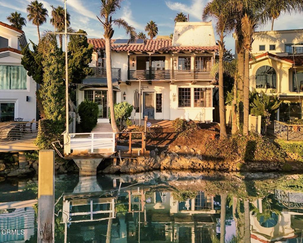 Rare Opportunity in the Ventura Keys.Discover a truly one-of-a-kind Ventura Keys custom home featuring a large waterfront easement(72 ft long by 39 ft and 23 ft wide). From the moment you enter the main gate, this incredible Spanish-style residence evokes the charm and elegance of old Hollywood.While the home is in need of restoration, once brought back to life it will be nothing short of spectacular. This iconic property offers 3 bedrooms and 3 bathrooms, with dual direction channel views that capture the essence of waterfront living.A spacious storage room above the garage +- 440 sqft adds versatility, complete with multiple access points. Behind the privacy wall, you'll find a three-car garage. In addition there is a wrap-around driveway for ample parking.Full of character and architectural charm, the home includes a beautiful solarium overlooking the pool and landscaped grounds, multiple dining options, and many custom features. This remarkable property is a must-see--an exceptional chance to restore a true Ventura Keys classic and enjoy it for generations to come.