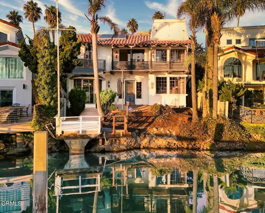 Rare Opportunity in the Ventura Keys.Discover a truly one-of-a-kind Ventura Keys custom home featuring a large waterfront easement(72 ft long by 39 ft and 23 ft wide). From the moment you enter the main gate, this incredible Spanish-style residence evokes the charm and elegance of old Hollywood.While the home is in need of restoration, once brought back to life it will be nothing short of spectacular. This iconic property offers 3 bedrooms and 3 bathrooms, with dual direction channel views that capture the essence of waterfront living.A spacious storage room above the garage +- 440 sqft adds versatility, complete with multiple access points. Behind the privacy wall, you'll find a three-car garage. In addition there is a wrap-around driveway for ample parking.Full of character and architectural charm, the home includes a beautiful solarium overlooking the pool and landscaped grounds, multiple dining options, and many custom features. This remarkable property is a must-see--an exceptional chance to restore a true Ventura Keys classic and enjoy it for generations to come.