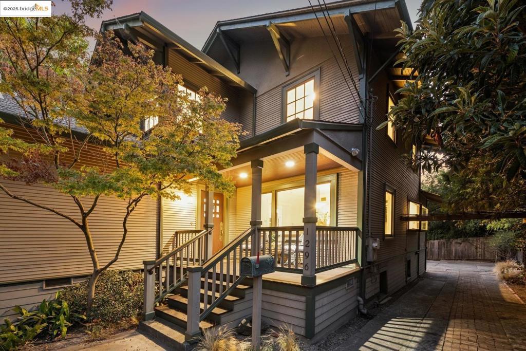 1296 Monterey Ave isn’t the kind of place you notice right away. It’s tucked back behind another house, almost like it wants to stay a little hidden. That’s part of the charm—once you find it, you feel like you’ve discovered a little retreat. A creek runs nearby, adding just enough of that calming background sound to remind you nature is close, even in the middle of Berkeley. The living room is bright and spacious, with doors that open out onto a deck that feels like it’s perched in the trees. Surrounded by greenery and overlooking the creek, it’s the kind of spot where mornings start slow with coffee and evenings stretch long with friends. The 3 spacious upstairs bedrooms all have their own personality. One of them has this little nook that works just as well for a desk as it does for a play space. In addition there’s a bonus room with wood paneling that feels like it’s been there forever—warm, cozy, and perfect for late-night projects or curling up with a book. Downstairs, there’s a huge bedroom with a half bath that could easily be turned into a roomy primary suite if you wanted. And while the house feels private, you’re just a short stroll from Hopkins Street with its bakeries, markets, and cafés. It’s that perfect balance of privacy and convenience.