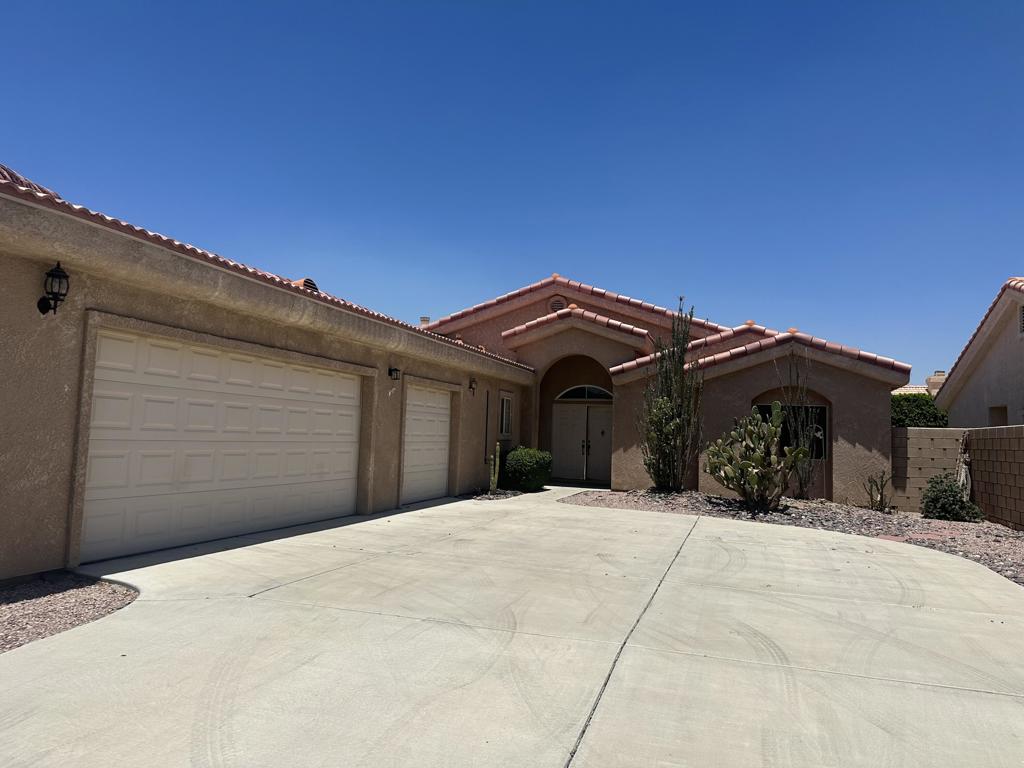 Don't miss this opportunity for a great home for lease in this desirable North La Quinta area, Large hone with over 2200 square feet, with three large bedrooms and three full baths. Huge great room adjacent to the large kitchen with great bar seating. High ceilings throughout and fireplaces in great room and master bedroom and bathroom. Garden-like setting in backyard. Huge three car garage too! Ideally located across the street from John Glenn Middle School and close to shopping and restaurants.