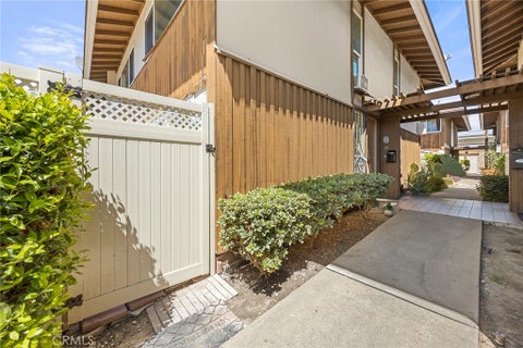 Photo of 15500 Tustin Village WAY #25, Tustin, CA 92780 (MLS # PW26174953)