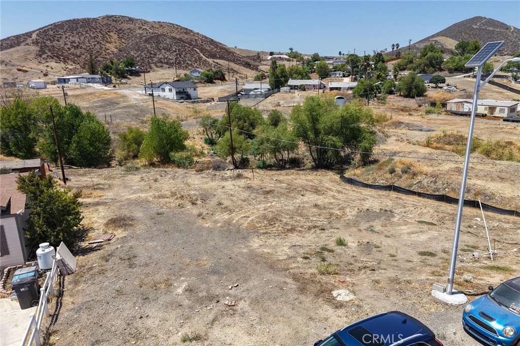 Land approximately 20,000 sq ft (.46 acres). Corners of the property have been surveyed, marked and recorded with the City of Menifee. Septic moratorium has been lifted for this property (as per the City of Menifee, buyer to confirm). Ready to build with utilities at the street.