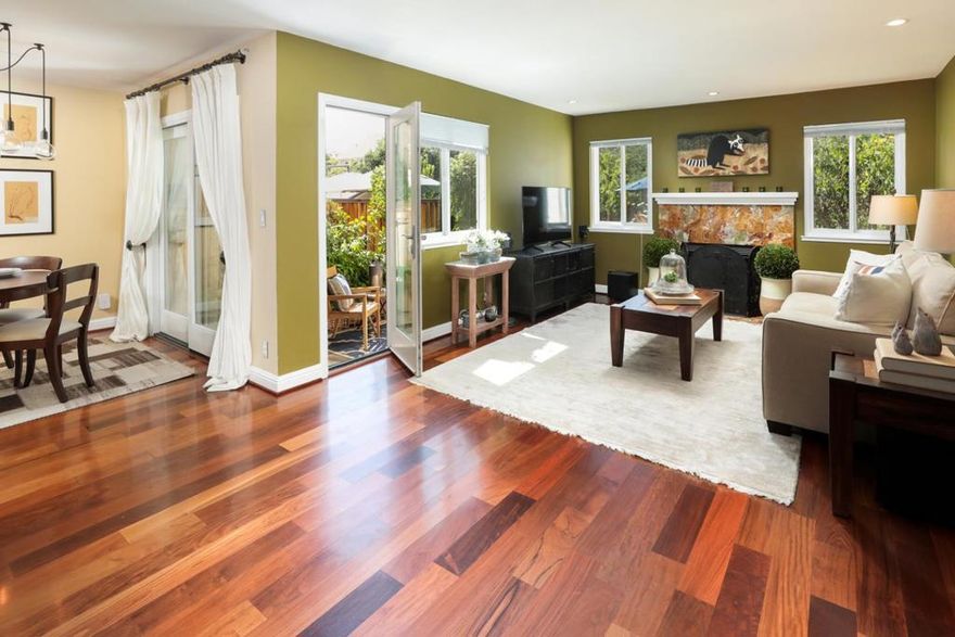 Welcome home! Inside you will find a formal entry with Onyx tile flooring, large living room with a Onyx tile covered fireplace and a dining area that provides access to the fenced backyard oasis. Like to cook? If so, you're going to love the gourmet kitchen that is complete with extended height stained maple cabinets with shaker doors, soft close hinges, wine rack, 6 drawer pantry plus top shelf, concealed outlets and under cabinet lighting, quartz countertops, custom glass tile backsplash, stainless steel sink, LG double door refrigerator, Viking dishwasher, four burner Viking gas range and a Viking cooktop hood. Some features and improvements include hardwood flooring, newly installed carpeting, recently painted interior, double pane windows, recessed lighting, upgraded light fixtures, forced air heating, air conditioning, and a separate laundry area with LG washer and dryer and an attached oversized one car garage plus an additional parking spot up front.