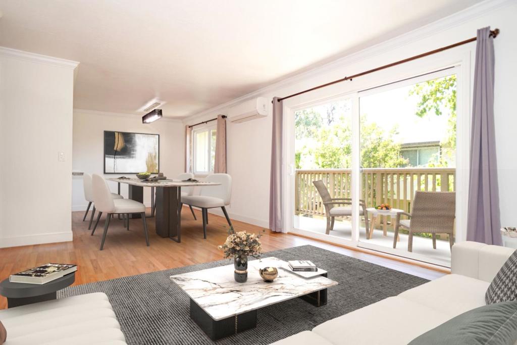 Step into this inviting 2nd-floor condo in the heart of Mountain View, just minutes from tech companies like Google, Waymo, and LinkedIn. This bright and airy 2-bedroom, 1-bathroom home boasts double-pane windows, laminate wood flooring, and a cozy balcony perfect for sipping morning coffee or unwinding in the fresh air. Enjoy the convenience of in-unit laundry, complete with a stackable washer and dryer. Stay comfortable year-round with a mini split AC heat pump. Plus, the freshly painted walls and ceilings make this home truly move-in ready! As part of a well-maintained community, you'll have access to fantastic HOA amenities, including a sparkling pool and a clubhouse for gatherings and relaxation. Top-rated schools nearby make this an ideal location for families seeking excellent education options. Don't miss your chance to own this Starter Home Gem by scheduling a showing today! Images contained virtual staging for illustration purposes only.