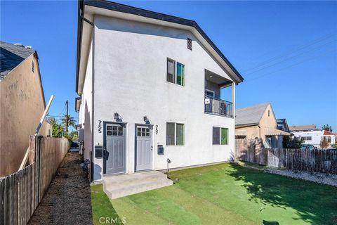 Photo of 755 E 84th Pl, Los Angeles, CA 90001 (MLS # IV25243721)
