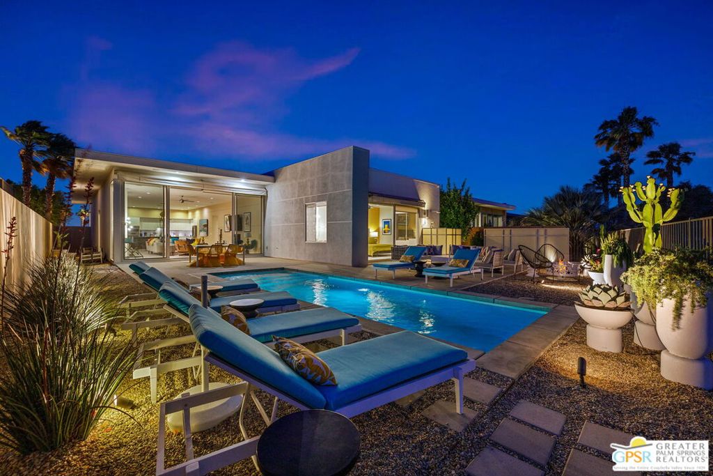 *** Monthly Rates: Only November to January - $10,000. AVAILABILITY: Only November 2025 to January 2026. *** Escape to the desert this winter and embrace the amazing weather with a seasonal lease available from November to January in the prestigious guard-gated community of Escena, Palm Springs. This immaculate and stylish home offers unmatched panoramic mountain views, stunning sunsets, and occasional snow-capped peaks as your everyday backdrop. Step inside to a beautifully updated and fresh interior featuring soothing tones in the great room. Floor-to-ceiling sliders frame the breathtaking views, turning them into your living art. Cozy up by the gas fireplace, enjoy the built-in shelving, and appreciate the designer lighting in the dining area, all creating a warm and inviting ambiance. The oversized primary suite also offers those magnificent views and a spa-like bathroom complete with double sinks, a soaking tub, and two spacious closets. Your guests will be equally comfortable in the two additional suites, which can also serve as a home office. An extra powder room adds convenience for everyone. Relish in the incredible Western exposure, making every sunset a spectacular experience. The West-facing sliders feature automated canopy covers, providing shade on warmer days as you lounge by the pool or rinse off in the private outdoor shower. The expansive outdoor area offers plenty of space to relax and enjoy the views of the golf course greenery. Escena's prime location offers easy access to the clubhouse, restaurant, and CV Link while maintaining a comfortable distance from major vehicles and air thoroughfares. This discerning, stylish, and tasteful home with jaw-dropping views is ready to welcome you for an unforgettable desert experience.