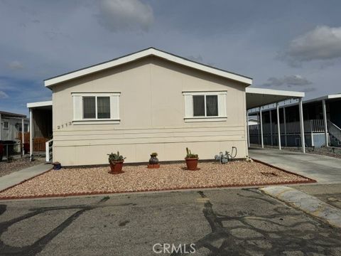 Photo of 2113 Windflower Drive #107, Rosamond, CA 93560 (MLS # SR26036460)
