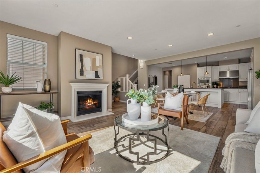 This beautifully maintained 3-bedroom, 2.5-bath condo offers 1,832 square feet of stylish and comfortable living in one of Yorba Linda’s most convenient and central communities. Step inside to discover a bright, open layout with generous living spaces designed for both everyday living and entertaining. The home showcases tile flooring and recessed lighting throughout the downstairs. The spacious upgraded kitchen with sleek quartz countertops, a large island, and abundant work space for cooking or casual dining. Outfitted with a GE stove and dishwasher, Samsung refrigerator, and a walk-in storage closet, this kitchen is perfect for the home chef. The large primary suite is a true retreat, offering a walk-in closet with custom organizers, an en-suite bath, dual vanity, separate shower, and soaking tub. Two additional bedrooms provide plenty of flexibility and share a convenient Jack and Jill bathroom. All bedrooms feature ceiling fans, custom blinds, and closet organizers for added comfort. Enjoy the ease of an upstairs laundry room with plenty of storage and counter-space. The 2 car garage has been upgraded with overhead storage racks, epoxy flooring and a retractable garage screen door. A gated private front patio overlooking the greenbelt provides the perfect spot to BBQ or unwind. Additional highlights include Nest thermostats on both levels, LifeSource water filter, and tankless water heater. Enjoy the best of community living with a resort-style HOA that includes a sparkling pool and spa, clubhouse, playground, BBQ, picnic areas, and security patrol. Perfectly situated near top-rated schools, shopping, dining, parks, and easily accessible to freeways, this home combines comfort, convenience, and the unbeatable Yorba Linda lifestyle. Don’t miss your chance to own a beautiful home in the center of everything Yorba Linda has to offer!