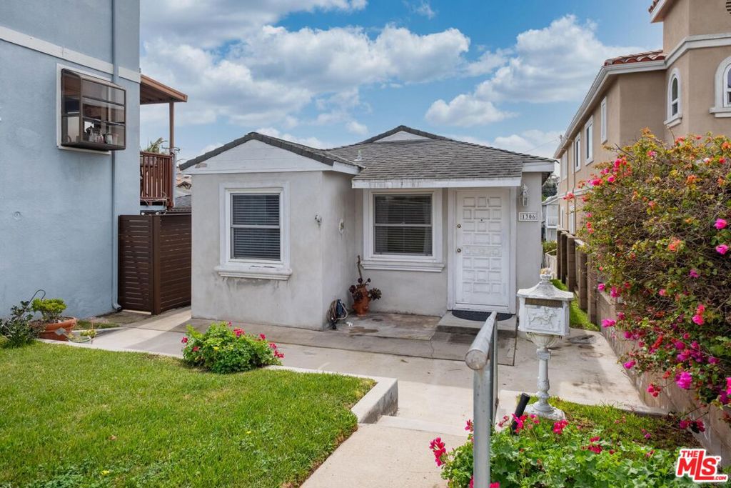Introducing 1306 Carmelita Ave, situated close to the Hermosa Beach border, this charming beach cottage in the Golden Hills of Redondo Beach is a prime investment or future dream home. Sitting on an oversized street-to-street 3,334 sqft lot, this property offers endless possibilities. Whether you're looking to renovate, expand, or build from the ground up. Originally a 3-bedroom home, the layout has been modified to a spacious 2-bedroom, 1-bathroom design, enhancing the living space. Inside, you'll find a bright open-concept great room, hardwood floors, and an updated kitchen. Located in the sought-after Jefferson Elementary district, this neighborhood is known for its tight-knit community, local events, and quiet streets with minimal through traffic. This unique lot provides parking for cars, a 1-car garage, and both front and back yards, with dual access from Carmelita Ave and Haynes Ln, two of the most desirable streets in Golden Hills.