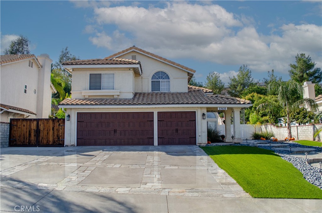 Stupendous 4 bedroom + 3 baths + loft, Pool home with paid SOLAR and park quality 1/2 size basketball court! This well cared for home offers fantastic curb appeal with stone slate hardscape, beautiful faux wood garage doors, and gate with side yard room for outdoor toys / RV, and other storage, including pool equipment and pump, and AC unit. The front yard is expansive and low maintenance with vibrant turf situated on a cul-de-sac street. The double door entry welcomes you inside to cathedral ceilings, plantation shutters, laminate wood flooring throughout with open living, dining, and family areas all open to the kitchen with countertop bar seating, and a downstairs bedroom & upgraded 3/4 bathroom with step-in shower.
Stainless steel appliances stay with the kitchen as does the backyard patio furniture, umbrellas, 2 built-in shade covers (which extend from the patio cover to the pool's edge), the downstairs washer / dryer set in the laundry room, and the cabinets in the garage with work bench area.
The kitchen faces the family room with a gas fireplace & views through the glass slider door to the pool and covered patio! There are 2 NEST thermostats and a loft upstairs which has a sectional couch also included in the price of the home. Ceiling fans are in all bedrooms and family room and loft. There is NO HOA and NO MELLO ROOS! This neighborhood is close proximity to shopping centers, nearby restaurants, and the freeway. The elementary, jr. high and high school are close too - buyers to verify the local school district for information. Preview today! This is the home you have been waiting for with potential to add a few touches of your own.