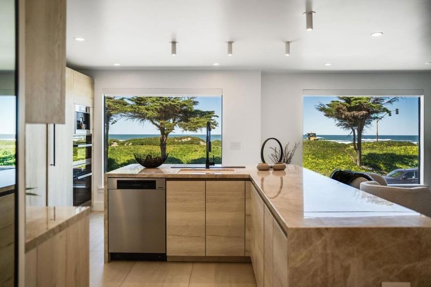 Welcome to The Beachfront Bungalow: this stunningly remodeled front-row property boasts one of the most coveted addresses for those that love the surf: 1818 Great Hwy. Fully re-imagined and remodeled, this home is the rare combination of beautiful modern finishes and an unbeatable oceanfront location, with convenient access to the best waves, views, and amazing shops and restaurants that the Outer Sunset has to offer. Featuring three bedrooms, three gorgeous stone spa-like bathrooms, & a breathtaking open kitchen/living/dining room with oversized windows framing views of the water and sky... this is the home you have been patiently California dreamin' about. With a large entry lounge with fireplace and TV, a flexible family room/office, the third bedroom and ensuite bath all on the ground floor, plus a beautifully finished bonus 120sqft office in the backyard, this is everything Ocean Beach: wash off the surfboards in the garage wet room in the am, work from the detached home office through the pm, and enjoy the quiet luxury of sunset views at dinner, fire crackling on the magical suspended fireplace. And with easy access to the backyard, your private tropical outdoor oasis is always just steps away, fire pit beckoning on chilly nights! This is the one you have been waiting for.