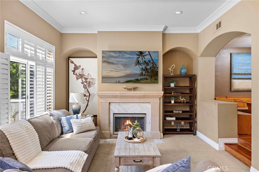 Welcome to 6 Avenida La Promesa, a charming Spanish-style residence tucked away on a quiet cul-de-sac in the prestigious guard-gated community of Coto de Caza. This 3-bedroom, 3-bath home blends warmth, character, and functionality, offering both inviting indoor spaces and serene outdoor retreats.



Step inside to find an airy floor plan highlighted by natural light streaming through skylights, creating a bright and welcoming atmosphere. The kitchen features a casual eat-in dining space and opens to a cozy bar area, perfect for entertaining guests. A formal dining room provides additional space for hosting dinner parties or holiday gatherings. The family room centers around a warm fireplace, creating an inviting place to gather.



The main floor also includes a versatile flex room—currently used as a bedroom—that’s ideal as a guest suite, office, or playroom.



Upstairs, the primary suite offers a private balcony, walk-in closet, and a fireplace retreat for added comfort. Conveniently located on the upstairs landing, the laundry area provides ease of use for everyday living.



The spacious living areas flow seamlessly to the outdoors, where a private back patio is ideal for relaxing or dining al fresco.



Located within the renowned community of Coto de Caza, residents enjoy exclusive access to miles of hiking, biking, and equestrian trails, as well as optional memberships to the Coto de Caza Golf & Racquet Club featuring championship golf, tennis, fitness, and social amenities.



This home combines timeless Spanish charm with modern comforts in one of Orange County’s most sought-after communities.