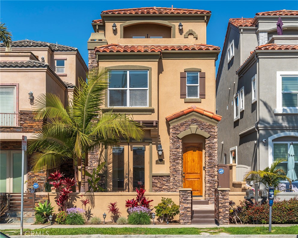 Experience coastal living at its finest in this beautiful 3-bedroom, 3.5-bath home located just steps away from Pacific City, Main Street, the pier, and more! This downtown Mediterranean-style retreat offers peek-a-boo ocean views from its balconies and combines elegance with comfort.
Key features include a spacious layout, a fully designed kitchen and multiple living areas. The home includes modern amenities such as central air, an elevator for convenience, and multiple fireplaces for cozy evenings. The home is completed in tile flooring downstairs and luxury vinyl planks upstairs and includes stainless steel appliances. It includes a washer, dryer and refrigerator.
With its prime location and design, this home perfectly balances beachside relaxation and vibrant city life.