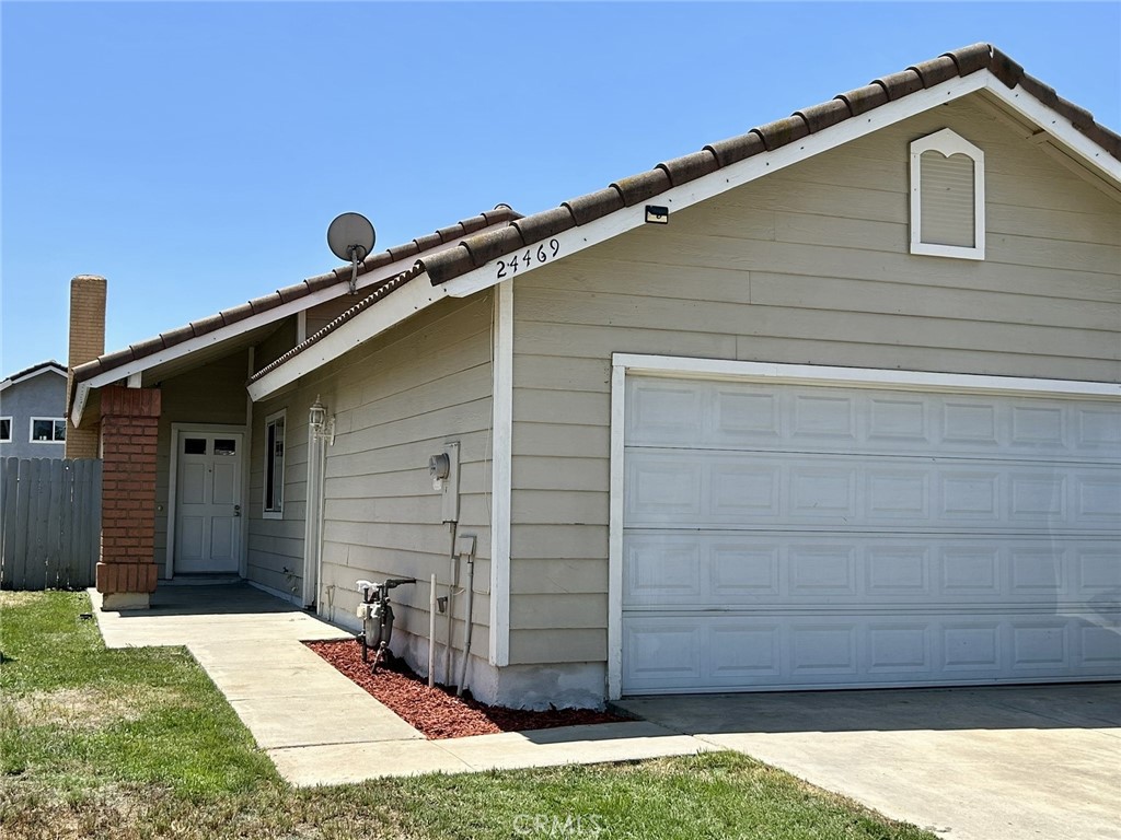 Charming Single-Story Home in Quiet Cul-de-Sac. Welcome to this move-in ready gem, ideally located on a peaceful cul-de-sac. This charming single-story home offers 2 bedrooms and 1 bathroom, perfect for first-time buyers, downsizers, or investors. Step inside to find vaulted ceilings and a spacious living room centered around a cozy fireplace. The open-concept dining area flows seamlessly into the kitchen, which features a new dishwasher and large window bringing plenty of light in. Dual-pane windows, new carpet in the bedrooms and durable tile flooring runs throughout the rest of the home for easy maintenance. Enjoy the comfort of central air conditioning and the convenience of an attached two-car garage with washer and dryer hookups. The large backyard offers a covered patio and plenty of space, a blank slate ready for your landscaping vision or outdoor entertaining. Just a short walk away is JFK Memorial Park, a beautiful neighborhood park spanning nearly 8 acres. This community favorite features four lighted tennis courts, a baseball/softball field, a shaded playground, barbecues, picnic tables, work-out area and walking paths, perfect for active lifestyles or relaxing afternoons. With nearby schools, shopping, and public transportation, this home is the perfect blend of comfort, location, and value. Schedule your private tour today!!