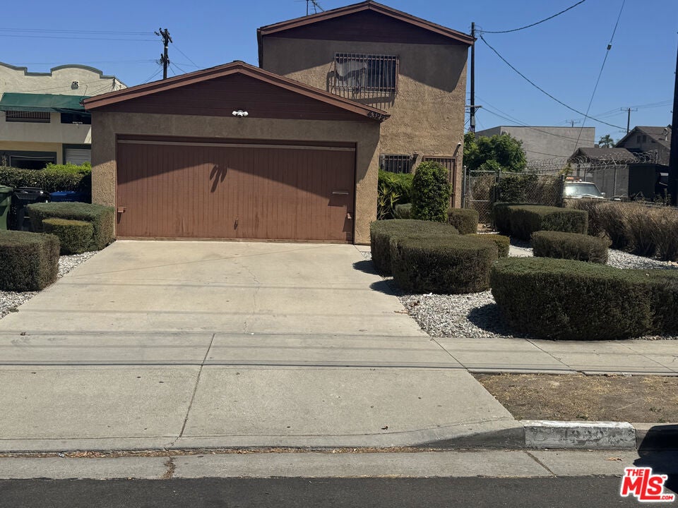 Photo of 4322 Denker Avenue, Los Angeles, CA 90062 (MLS # 26873697)