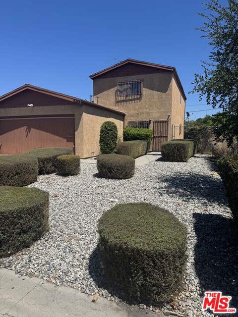 Photo of 4322 Denker Avenue, Los Angeles, CA 90062 (MLS # 26873697)