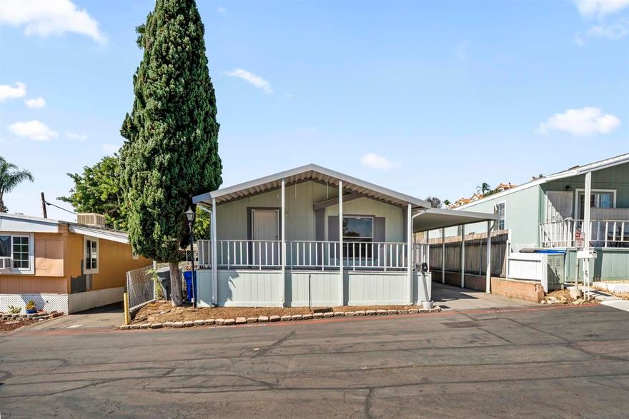 Welcome to this charming 3 bedroom, 2 bath manufactured home located in the desirable Lakeview Manor community of Spring Valley. Recently refreshed with new exterior/interior paint this home is move-in ready and full of comfort.  Step inside to find wood laminate and ceramic tile flooring throughout, vaulted ceilings, dual-pane windows, and ceiling fans in every room. Stay cool year-round with the addition of central A/C.  Enjoy your morning coffee or evening unwind from the covered front porch with tiled steps and flooring. Take in gorgeous views of the reservoir-a peaceful backdrop you’ll love every day.  This affordable family-friendly community offers resort-style amenities includes a clubhouse, billiards room, playground, basketball court, and sparkling pool. Conveniently located next to Sweetwater Reserve and only minutes to South Bay, East County, and Downtown. Financing available—don’t miss this opportunity!