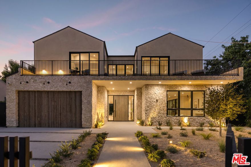 Newly built Modern-organic farmhouse displaying timeless design elements throughout and situated in one of Encino's most coveted neighborhoods. This estate epitomizes luxury showcasing Roman Clay plaster throughout, the finest fixtures and unmatched craftsmanship. Impressive high ceilings and open-concept layout flows seamlessly into the bright and airy living spaces. Main living areas are exquisitely crafted providing ultimate comfort while also being an entertainer's dream. At the heart of the home the Chef's kitchen offers custom oak cabinetry, top notch appliances, and an oversized island with a breakfast bar. The luxurious primary suite offers an oversized walk-in closet, balcony overlooking the yard, and spa-inspired bathroom. An attached 1 bed ADU with kitchen perfect for an in-laws suite, in-home office or maids quarters. The spacious backyard that could be your private oasis featuring lush landscaping, a sparkling pool/spa and BBQ area with a bar seating. Ideally located near Encino's best shopping,restaurants and top rated schools.