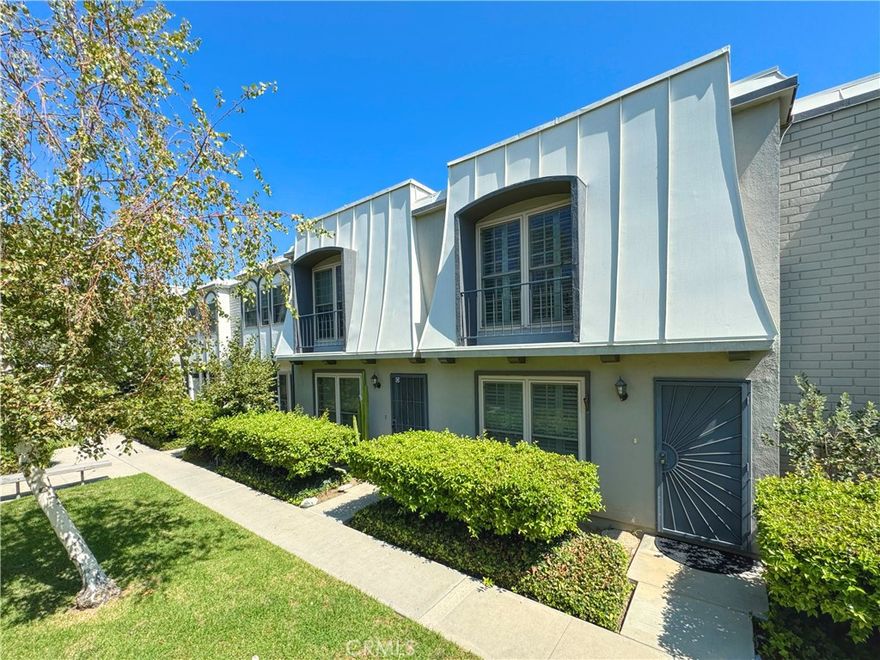 Spacious and updated two bedroom, one and a half bath townhome complete with in-unit laundry, fireplace, and relaxing private patio. Enter into the open floorpan living with an eat-in kitchen and dedicated dining area. There is a half bathroom off of the laundry room for guests while the mature orange tree will provide plenty of shade for entertaining or a lazy afternoon outdoors. Upstairs, two bedrooms share a jack-and-jill bath. 



Additional features include ample storage, a covered parking space with storage units above, and a gated complex set on 8.5 acres of beautifully maintained parklike grounds. The grounds feature lush grassy areas, walkways, and flowers, as well as a sports court, putting green,  two swimming pools, a kids’ pool, and a playground. A recreation room with a full kitchen is also available.



The monthly fee covers property taxes, fire and EQ insurance, water, trash, sewer charges, exterior maintenance of buildings and grounds, and more. This townhouse is conveniently located near The Village, Westfield Topanga shopping Center, Warner Center Park, Kaiser/UCLA medical, and fine restaurants, Warner Center  Concerts in the Park. It’s also just over Topanga Canyon for great  hiking trails.



Don’t miss out on this great location to call home. Schedule an appointment today!