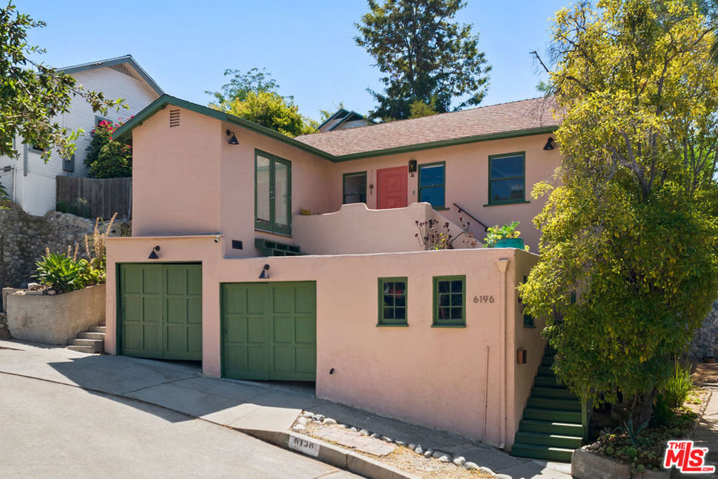 Available for lease, this spacious bungalow is offered furnished in Highland Park's serene Garvanza enclave. The 1924 home has been tastefully remodeled, showcasing a breezy open-plan layout with leafy views and warm wood floors. The mid-century-inspired kitchen pops with colorful details and tile, and modern appliances make meal prep a pleasure. Spread out in two peaceful bedrooms and unwind from the week in the stylish bath with a soaking tub. The backyard is a peaceful retreat for entertaining and lounging while enjoying hillside views. Amenities include central heat/air with Nest controls, a washer and dryer, and additional storage under the home. Situated to enjoy the best of Highland Park, you're close to local favorites Little Beast, Amara Kitchen, the Eagle Rock Recreation Center, and more.
