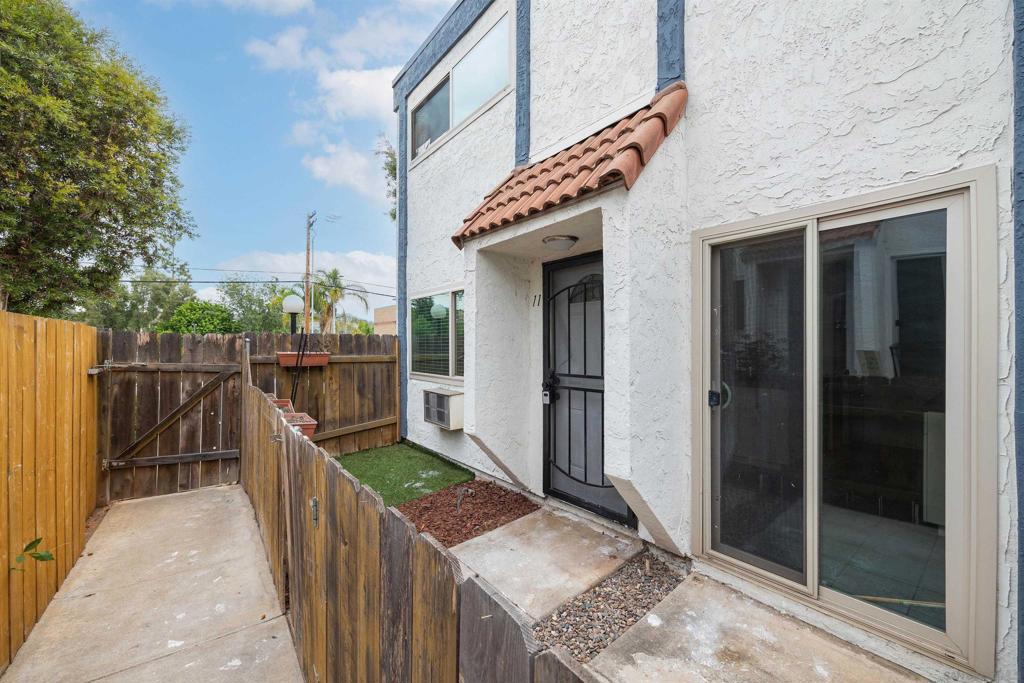 Step into this beautiful 2-story townhome that has everything you need! The front patio has ample space to accommodate a small grille and is very low maintenance. On the bottom floor you'll find the spacious living area, the newly updated kitchen with modern appliances and updated counter tops, a sliding glass door that gives access to the patio, the washer/dryer, as well as the half bathroom. There is also 2 extra storage rooms beneath the stairs, one of them housing the water heater. There is a wall heating/AC unit, as well as a fan in the dining area to help keep the place cool! The upstairs has extra cabinets in the hallway, as well as the full bathroom and the two bedrooms, which also have ceiling fans. There are also two assigned parking spaces, a community pool, as well as a small storage unit beneath the covered parking space. Water/Trash included, tenant responsible for all other utilities. 2 assigned parking spaces. Only 1 small pet under 30 lbs allowed.