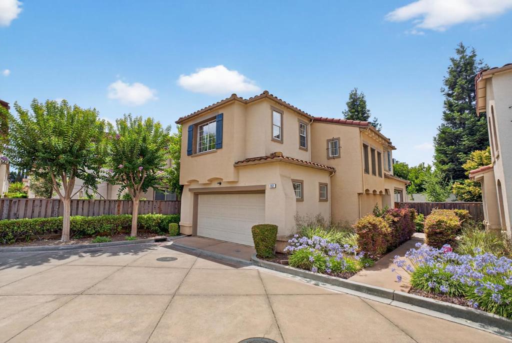 Step into the perfect blend of comfort, style, and location in this beautifully appointed Mediterranean-style home in the sought-after Villas at Santana Park. This spacious 3-bedroom, 2.5-bath residence offers 1,739 square feet of thoughtfully designed living space just steps from Santana Row and Westfield Valley Fair Mall. From luxury shopping and dining to boutique fitness, coffee shops, and vibrant nightlife, everything you need is within walking distance. The home features a bright, open floor plan with a welcoming tiled entry, soaring ceilings, a cozy fireplace, and large windows that fill the space with natural light. The kitchen is perfect for entertaining, with gas cooking and seamless flow into the dining and living areas. Upstairs, the spacious primary suite offers a private retreat with generous closet space and a large ensuite bath. A private backyard patio provides a relaxing outdoor space with minimal upkeep, and the attached 2-car garage offers ample storage and convenience. Located in a quiet, well-maintained neighborhood with low HOA dues, this home combines the best of Silicon Valley living with easy access to major employers like Apple, Google, and Nvidia, plus quick freeway connections via 880 and 280.
