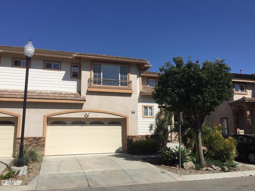 Large two story townhome with 3 bedrooms, a large open loft and 2.5 baths. Attached 2 car garage and a driveway. House is freshly painted throughout, new flooring. Open floor plan with high ceilings. Living room with fireplace overlooking a large open eat in kitchen. Master bedroom has walk-in closet with private bath with dual sinks. Large secondary bedrooms share a full bath. An open loft can be used as second family room. upstairs laundry. Private backyard with stamped concrete decking perfect for entertainment and kids play. Convenient location close to shops, schools, restaurants and Costco.