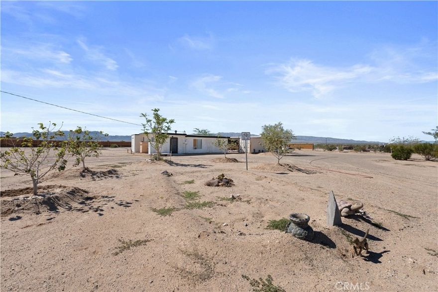 RIGHT OFF AMBOY RD! This fully fenced 2-bedroom, 1-bath desert fixer is brimming with possibility and profit potential. Situated on the grid with its own water well and updated electrical, this property gives you a solid foundation to bring your Wonder Valley vision to life.

Just east of the "almost-famous" Palms Restaurant & Bar and across from California State-owned land, you’ll enjoy unobstructed desert views, star-filled skies, and that endless horizon only the high desert can offer! Whether you’re dreaming of a short-term rental project, a desert art retreat, or a weekend hideaway, this property is the perfect blank canvas...ready for your design ideas and finishing touches. 

With water, power, fencing, and location already in place, the hard part’s done!

Come explore the raw beauty and wild potential of Wonder Valley! Where offbeat meets opportunity, and where every fixer can become a masterpiece. CALL TODAY TO SCHEDULE YOUR APPOINTMENT! (Note: Ai was used to declutter the interior of home)