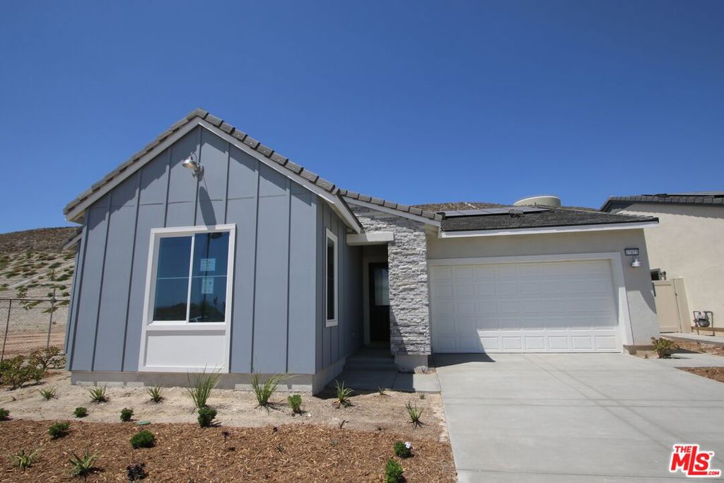 MOVE IN READY!-Altis at Skyline - An Active Adult Community by Tri Pointe Homes~ Desirable Single Story, 2 Bedroom Plus Game Room, Open Concept Home with 10 foot ceilings. Featuring a Beautiful Farm House Style Exterior, Modern Spacious Kitchen with Oversized Island breakfast bar and spacious pantry. Includes White Shaker Cabinets Throughout, Carrara Veil quartz countertops at Kitchen with custom matching backsplash. Light tone luxury vinyl plank in great room and kitchen. Live the Altis lifestyle with a community clubhouse that includes a game room, event bar, workout studio, pool, hot tub, open space, community BBQ and monthly community events! Pickleball courts, putting green, trails and more!