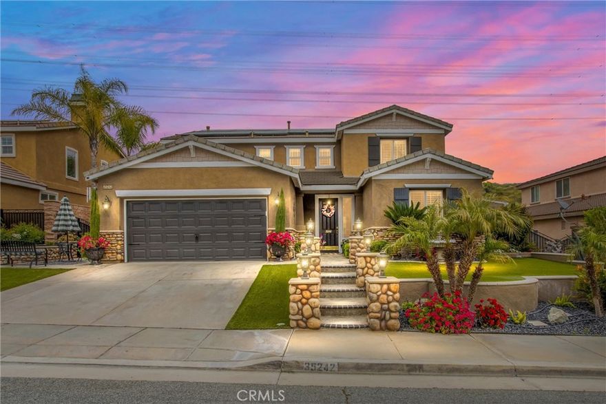 Hands down the nicest home on the block!!! Don't believe me? Come take a look for yourself, see this gorgeous 5bedroom, 3 bath home in just under 3000 sqft, sitting on a 6,534 sqft lot. From the moment you pull up to this home and behold the stunning curb appeal, you will realize that no expense has been spared, from the edge of the curb to the fence in the back!! Inside, the beauty continues; elegant crown molding, wood look tile throughout the main level, spacious family room with surround sound system, dining room and beautiful kitchen. There is one bedroom and full bath on the main level, but up the hardwood stairs to the second level, you'll find the spacious primary bedroom and bath, 3 other secondary rooms, and another full shared bath. Even the garage is updated, think of it as the perfect "man cave" already set up for an avid sports fan (make it your own). Out back, be sure to appreciate the built in BBQ/grill master area, firepit, stamped concrete, and absolute serenity of the location. Your new home will be the place where everyone wants to come hang out, providing you let them. But for you, you get to call this oasis HOME every day, you're welcome!! ... Please note the community amenities include a beautiful club house (where you may host large or small events - parties, weddings, quinceaneras, etc), lap pool and wading pool, kiddies splash pad, gym, miles of walking trails, sports parks, play grounds, pickleball court, frisbee golf course and basketball court. Internet included as well... There's just too much to mention, call to schedule your viewing today before it's gone!!