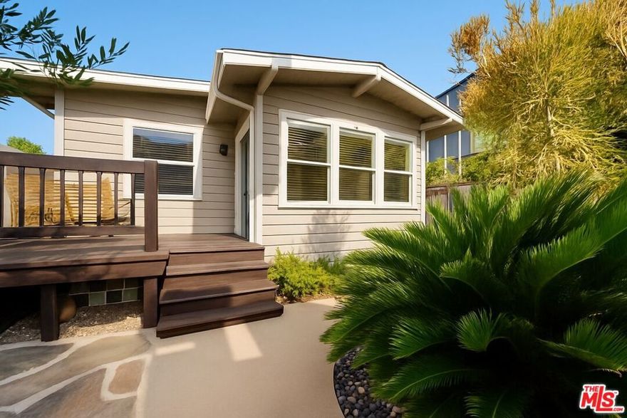 Tucked away on a quiet tree-lined street two blocks from Abbot Kinney, this property combines a Craftsman bungalow with a detached duplex. As you enter, you're greeted by lush landscaping that surrounds the grounds, one of the unique characteristics of this setting. The front bungalow includes a new roof, private deck, open layout, wood-beam details, and a built-in window seat. Each of the three residences offers two bedrooms, one bath, full-size laundry, and a private outdoor area. Shared interior elements include exposed beams, knotty pine flooring, and natural light. The rear up-and-down duplex carries the same interior features. Both duplex residences offer private outdoor areas; the lower unit's primary bedroom features double doors which open directly to its outdoor space, and the upper unit includes vaulted ceilings and skylights that create an open, airy feel. Gated parking for four cars sits at the rear with electric gate access. Ideal for an owner-user or investor with the option to live in one residence while leasing the others. Located steps from Abbot Kinney, the property offers walkability to dining, boutiques, and Venice Beach. Seller may complete an IRS 1031 Tax-Deferred Exchange at no additional cost or obligation to Buyer.