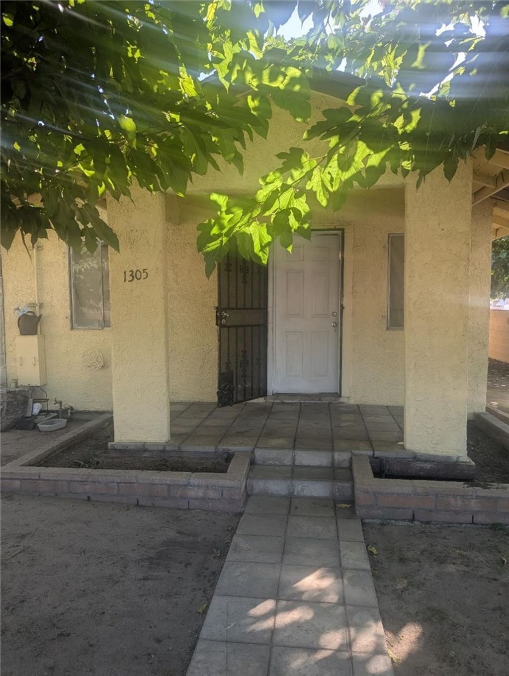 Photo of 1305 N Sierra Way, San Bernardino, CA 92405 (MLS # IV25244026)