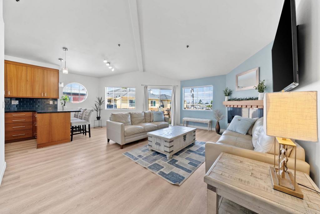 Welcome to coastal living at its finest! This spacious 3 bedroom, 3 bath condo offers 1,510 sq. ft. of thoughtfully designed living space, just two blocks from the beach. Built in 1998, the home features modern updates including new LVP flooring, a remodeled master bath, and a rare double master bedroom layout with walk-in closets. Enjoy soaring vaulted ceilings, a cozy gas fireplace, and three private patios, perfect for soaking in the ocean air. The upstairs patio boasts sunset and ocean views, while the other two patios provide a quiet retreat from the bedrooms and living area. The perks don’t stop there, enjoy an oversized private 2-car garage, in-unit laundry room, and a secure building with locked floor entrances give you convenience and peace of mind and low HOA fees. Best of all, this home is part of the walkable Imperial Beach lifestyle—just steps from the pier, estuary, coffee shops, and local restaurants. Assumable VA loan option available—a rare opportunity you won’t want to miss. This isn’t just a condo—it’s your beachside sanctuary. Don’t miss this rare opportunity to own a spacious condo in one of San Diego’s most charming coastal communities!