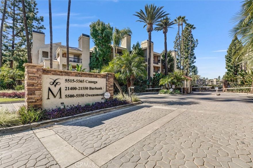 Revered as one of the best communities to live in Woodland Hills, The Met offers a resort-style living experience in the heart of Warner Center. This beautifully maintained 2-bedroom, 2-bath condominium features approximately 900 sq. ft. of light-filled living space, a private balcony, and an in-unit washer and dryer for everyday convenience. The open floor plan flows seamlessly from the living area with a cozy fireplace to spacious bedrooms with ample closet storage. Two assigned parking spaces and easy guest parking make day-to-day living practical and straightforward. Residents of The Met enjoy access to four sparkling pools, six tennis courts, a gym with locker rooms and saunas, and basketball and racquetball courts. The community is pet-friendly and gated with 24/7 security, offering both comfort and peace of mind.
Ideally located just steps from Westfield Village, Whole Foods, Ralphs, Sprouts, and top dining spots, this home blends luxury, convenience, and community in a way that's hard to match.