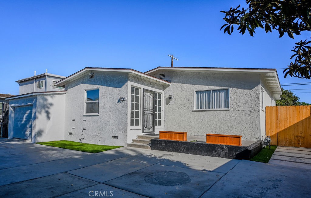 This single family home has three bedrooms and one bathroom. It offers plenty of space, including a front gated area for vehicles, play area and one-car garage for parking. The backyard is large, making it great for gardening and relaxing outside. The home features many improvements and repairs, so it’s ready to move in but can use a new owner’s vision for improvements and TLC. This property can also be a perfect investment for investors. Only minutes away from Sofi Stadium, LAX, major freeways, and downtown Los Angeles. It is a practical choice for anyone who wants easy access to local attractions and city living.