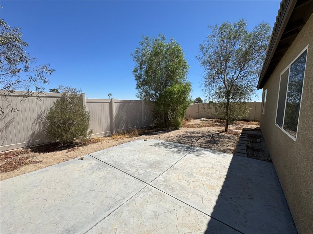 Welcome to this stunning home located in the vibrant city of Barstow, CA. This property, available for showing by appointment only, boasts four spacious bedrooms and two full bathrooms, perfect for those who value comfort and space. The home is equipped with solar panels, a sustainable and cost-effective solution for your energy needs. The large backyard provides ample space for outdoor activities or simply enjoying the beautiful California weather. The home's location is a standout feature, with easy access to the highway for commuting and proximity to local outlets for shopping convenience. This home is nestled in a great community, offering a harmonious living environment. Experience the perfect blend of comfort, convenience, and sustainability in this beautiful Barstow home.