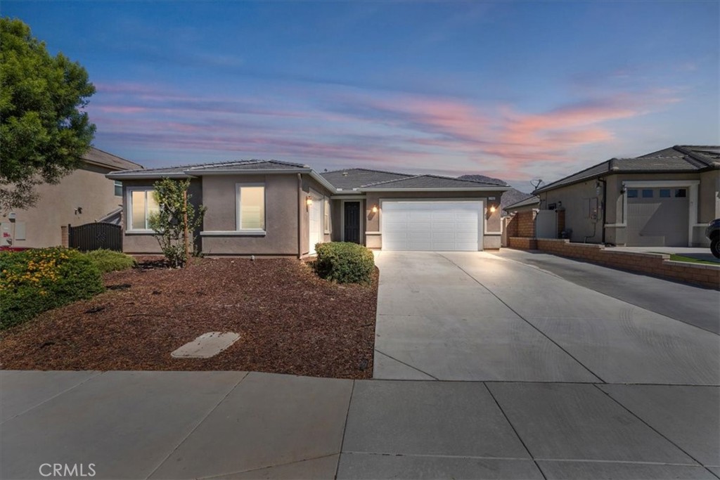 Situated on a quiet cul-de-sac sits this wonderful single-story home with 4 bedrooms, 3 baths with unobstructed views. The home provides plenty of parking with its expanded driveway and 3 car garage. The covered front patio is the gateway into the wide hallways and tall ceilings of this spacious open floor plan. In the front of the home you have 3 bedrooms, a large in door laundry room and full bath. The rear of the home has lots of open space where the kitchen, family room and dining room sit. A bonus bath and large family room/game room are located in the middle of the home. The spacious main bedroom, walk-in closet and main bath are also located in the rear of the home providing the owner privacy. The backyard has unobstructed views and provides open space for your imagination to design a new pool and entertainment area. This home comes with solar and many builder upgrades that include, powder half bath, upgraded appliances, in ceiling sound system, shower enclosure and soaking tub, upgraded kitchen cabinets, stainless steel farm style sink, gas stubs in backyard, gas fireplace, smart thermostat and smart key lock front door. Solar system has 12 panels, 4.2 KW. Located near to Grand Terrace. Minutes from University of Riverside, Loma Linda University and Loma Linda Hospital. Conveniently located near to the 1-10, 215 and 60 freeways in addition to shopping, dinner and entertainment areas.