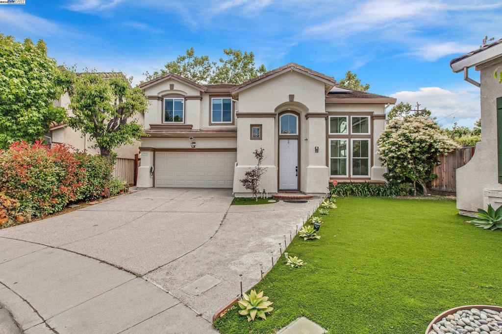 In an exceptionally convenient central location of San Leandro. 4 spacious bedrooms and 2.5 baths, 1,742 sq ft home offers an updated kitchen and bathrooms. Deluxe kitchen with quartz counters, stainless steel appliances, recessed lighting, breakfast bar, tile floor. Living and dining room combo with wood floor, chandelier lighting, large picture windows. Large primary suite with updated closet. Bathrooms feature dual vanity sinks with quartz top, stall shower, tile floor. Drought resistant landscaping in front and backyard, fruit trees, koi pond, 2 car garage, solar panels, tesla charging, central heating and air, Nest thermostat, gas fireplace, spacious storage shed, covered sunroom, laundry room, dual pane windows, corner lot. Short drive to BART for an easy commute. World-class food, shopping and parks. Close to 880 FWY, downtown San Leandro, Costco, Marina Plaza, Kaiser, Golf Club, Banks. A must see.