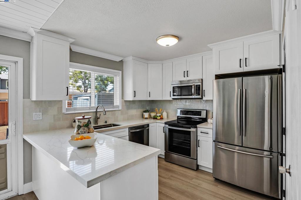 This four bedroom, two and a half bath floor plan has been tastefully updated. With over 1,300 square feet of living space, lots of natural lighting, and an enclosed patio, Some highlights include high quality vinyl flooring throughout home, stainless steal appliances and smart home features. Washer & Dryer included Brand new kitchen and countertops. Located in a quiet and well maintained community with close proximity to schools, recreational activity and easy access to the HWY 580 for those who commute. Less than 10 minute drive time to downtown Livermore. Prime location for a real estate investor looking to expand their portfolio, or a first time home buyer.
